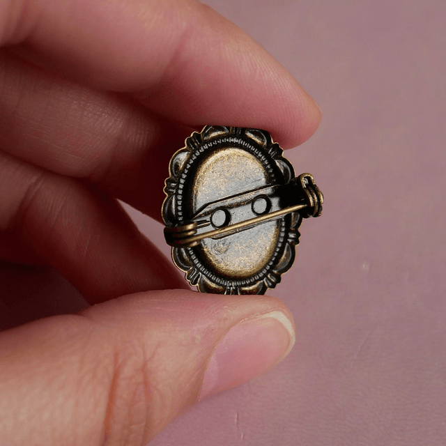 Broche ovale - Oiseau orange