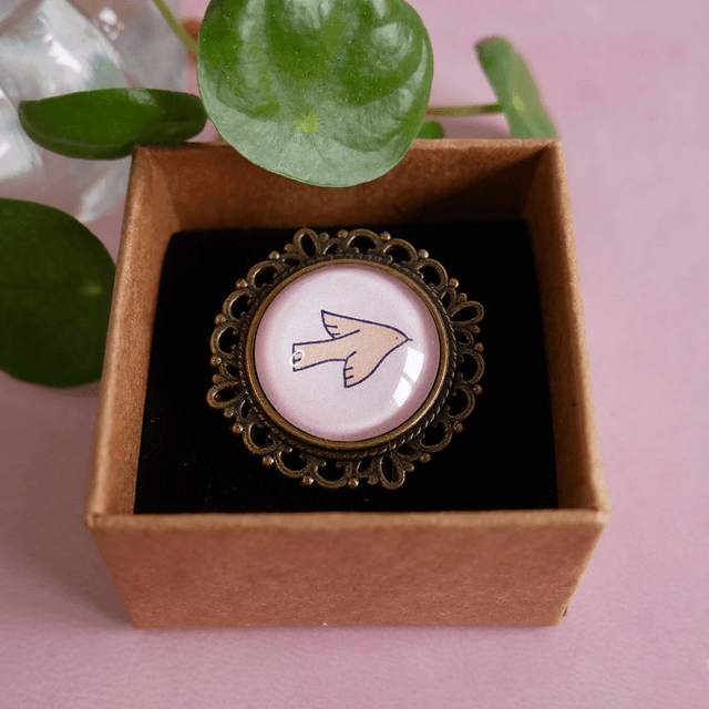 Broche ronde - Oiseau orange