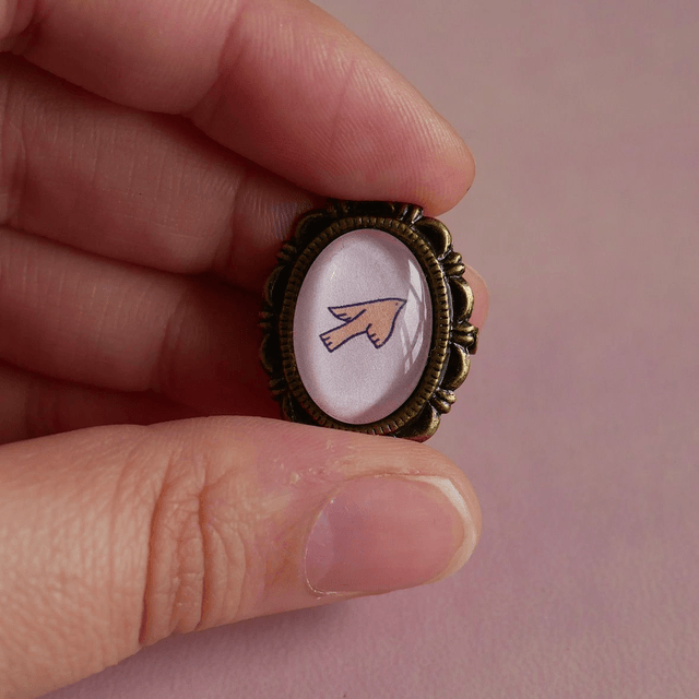 Broche ovale - Oiseau orange